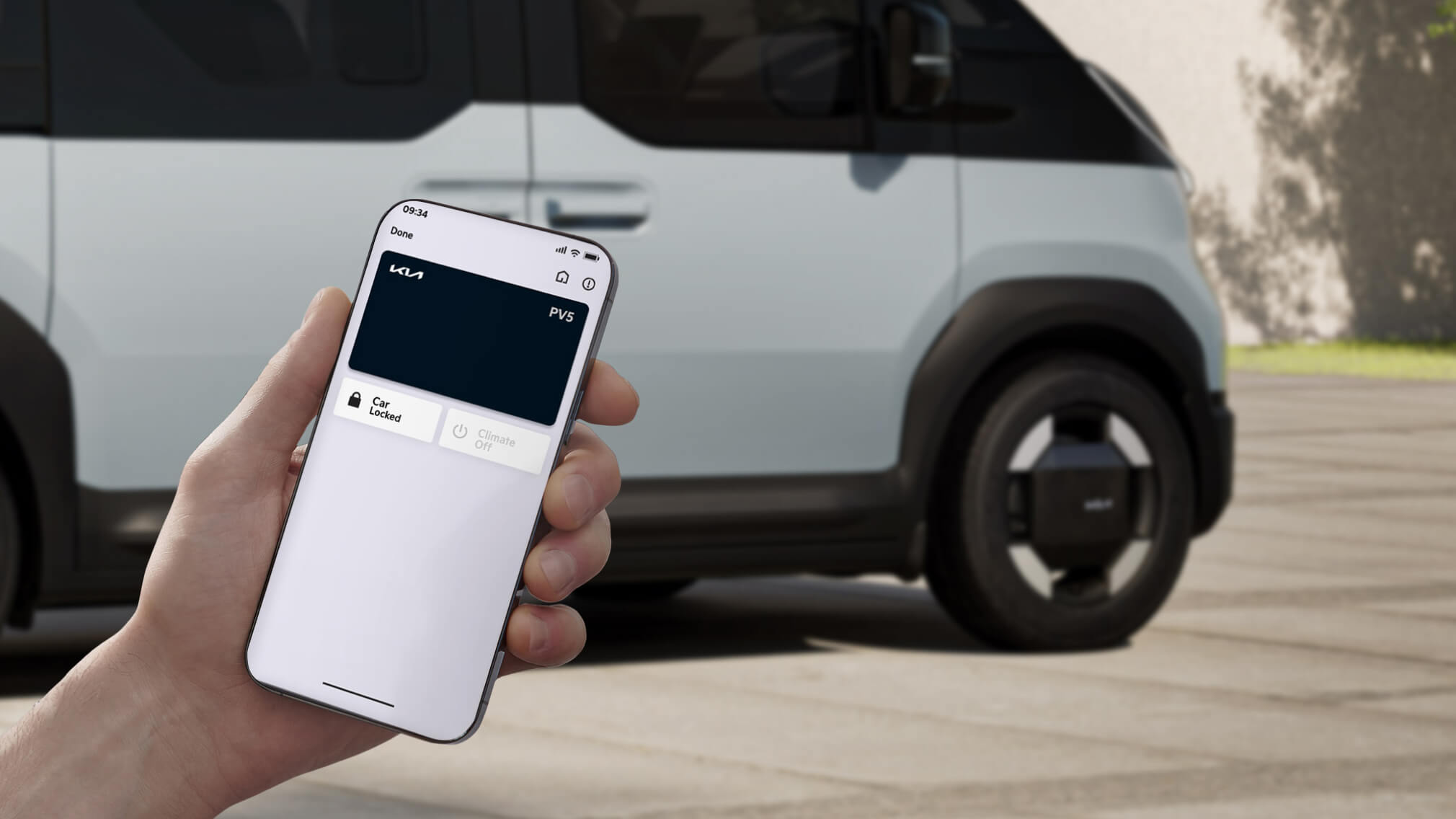 Main tenant un smartphone pour accéder à la fonctionnalité de clé numérique Kia