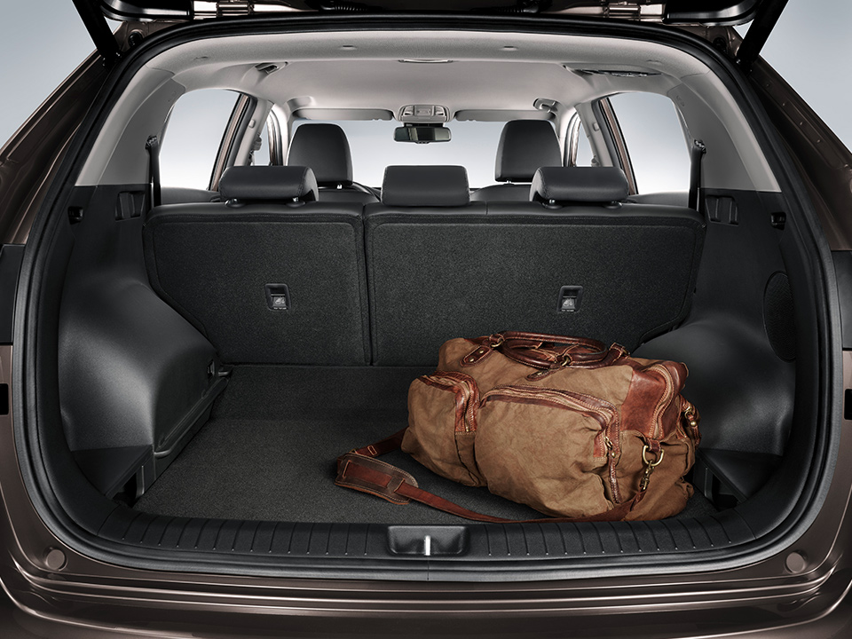Kia Sportage generous boot - Up
