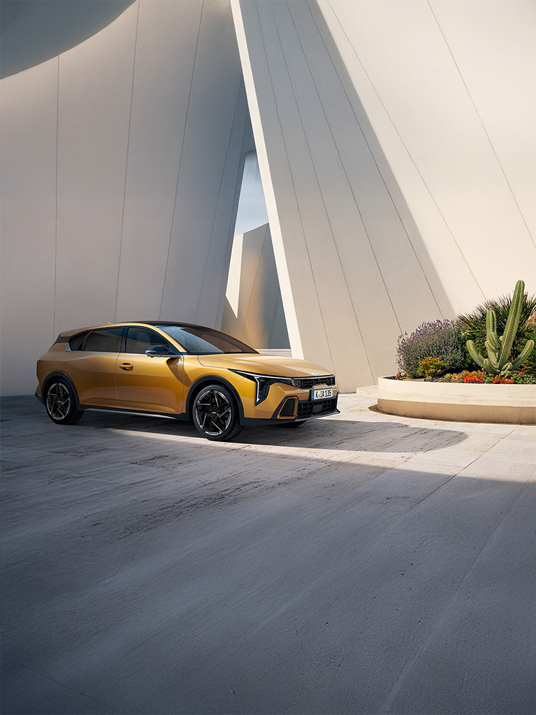The Kia EV2 Concept parked in front of trees