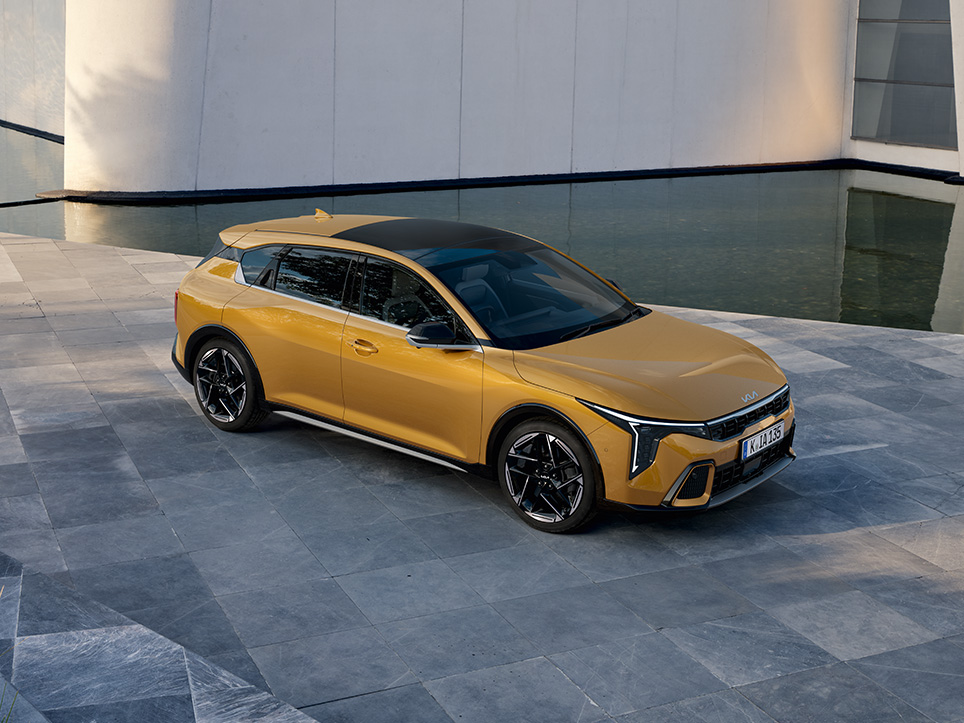 Aerial view of the Kia EV2 Concept parked on a road.